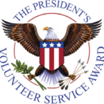 “President’s Volunteer Service Award logo: eagle with shield, olive branch, arrows, and U.S. flag.