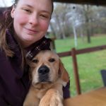 Abby Peterson and a PawPADs dog