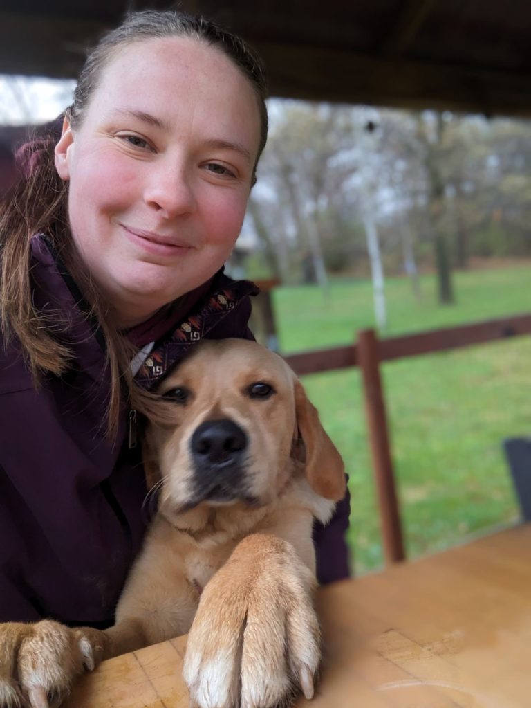 Abby Peterson and a PawPADs dog